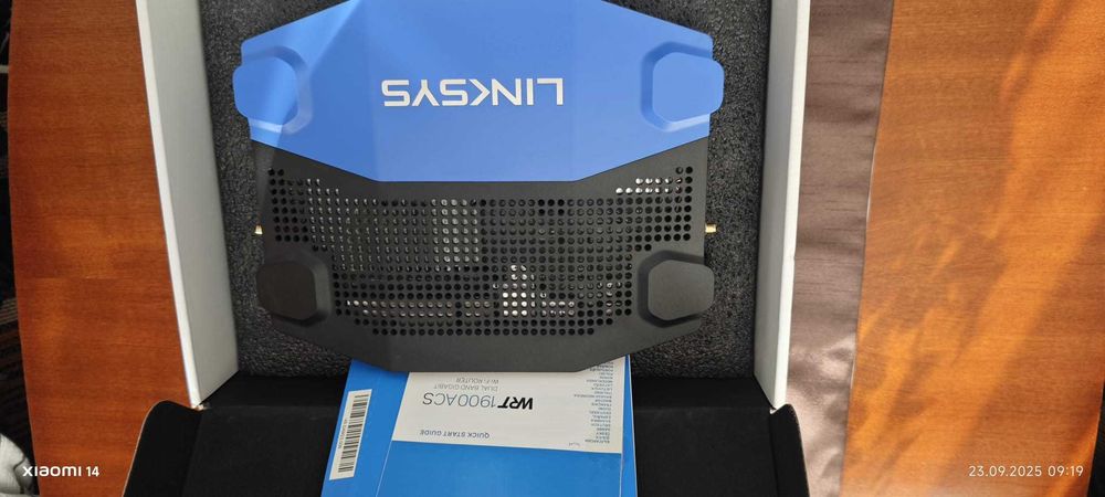 Router LINKSIS utilizat timp de 1 saptamana