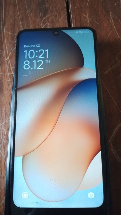 Продам редми12,в норм состояние есть маленькая трещина снизу