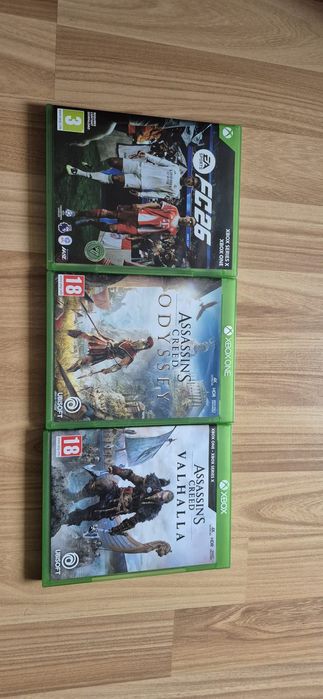 3 jocuri - FIFA 26, si 2 AC, controller