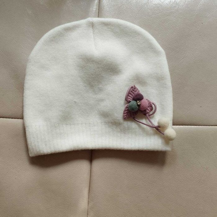 пуховичок для девочки и шапочка б.у. в отличном состоянии