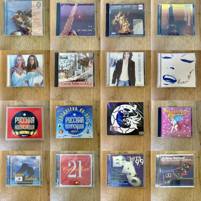 CD дисков  AC/DC, Pink Floyd, Mariah Carey, Bryan Adams и другие