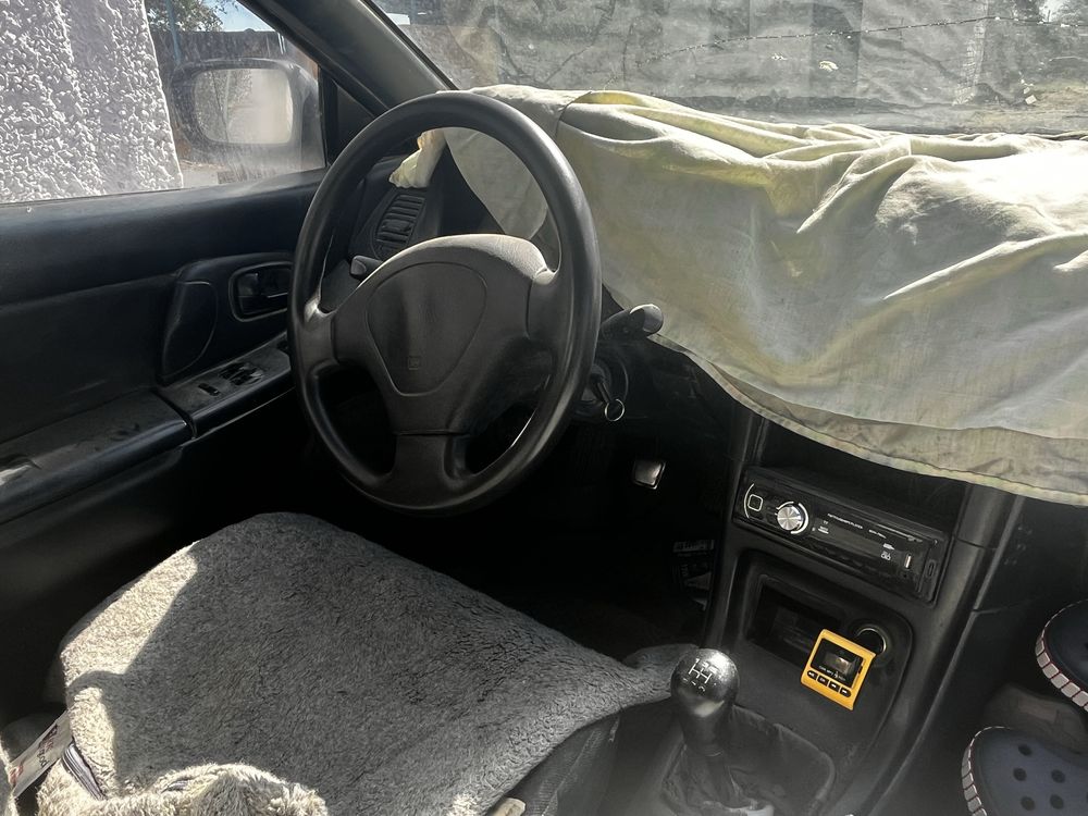 Mazda 323 1.5 с мотором DOHC