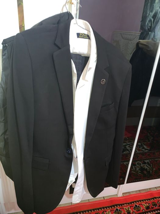 Костюм мужской покупали за дорого в России