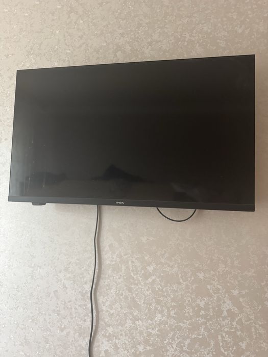 Телевизор состояние новое.