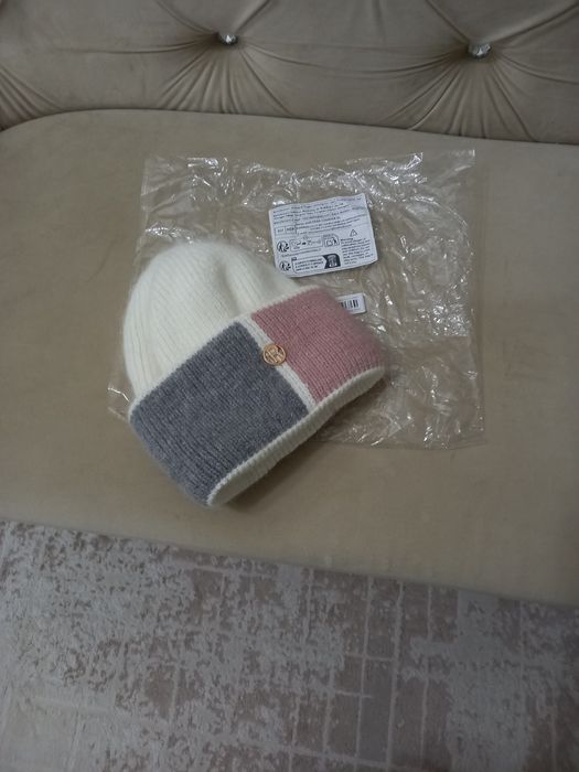 Продам вязанию шапку