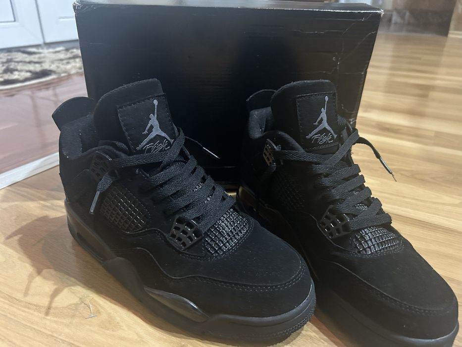 Jordan 4 black cat