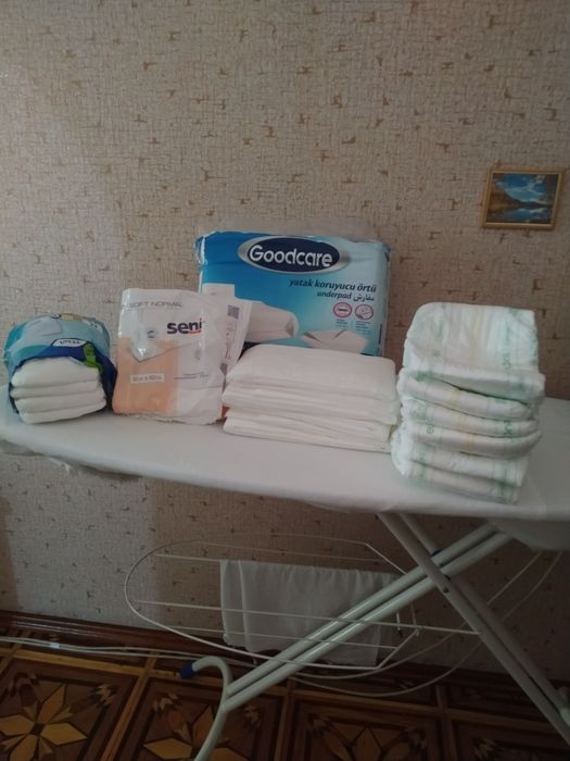 Пелёнки  новые 32 шт и памперсы 6 шт и трусы-памперсы 4 шт