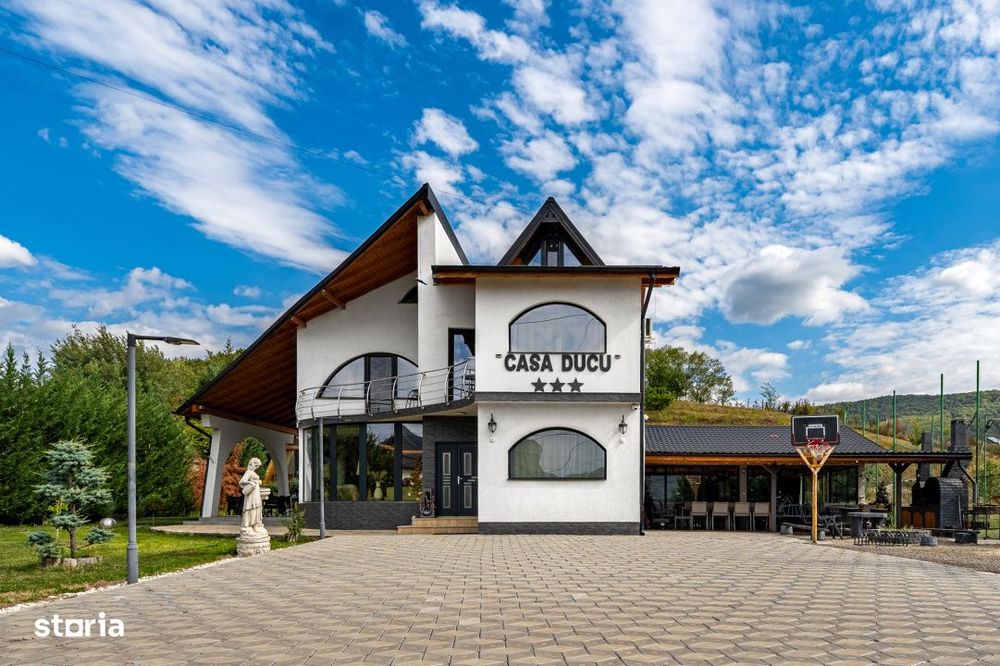 Vila turistica cu 8 camere + casute A-frame, teren 5575 mp Calimanesti
