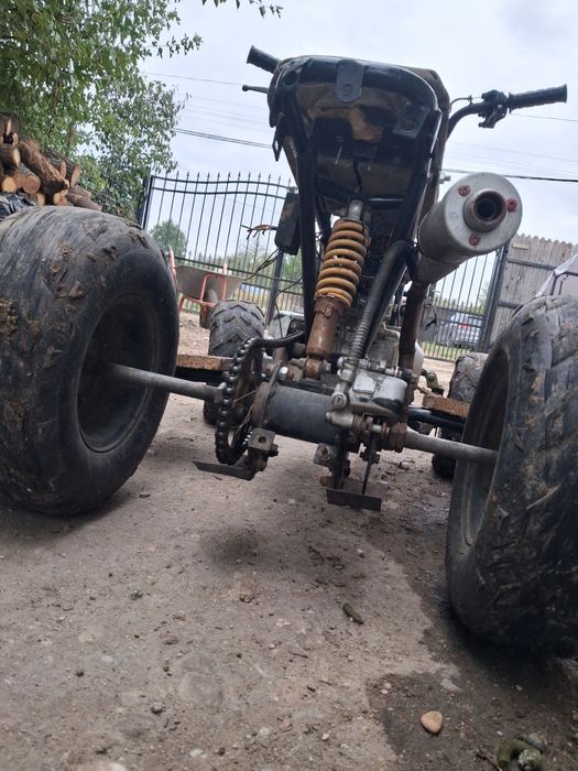 Vând atv 125 cc  funcționează