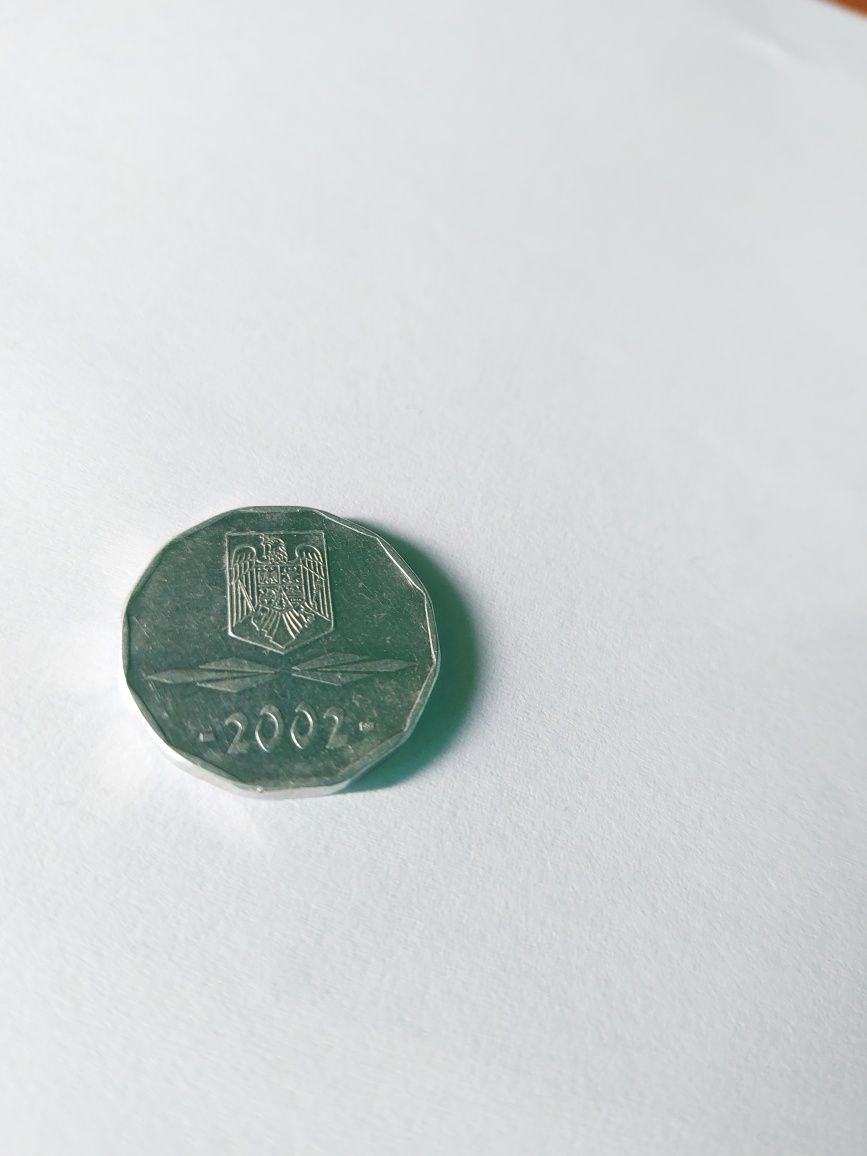 Moneda foarte rara de 5 000 lei din anul 2002 i