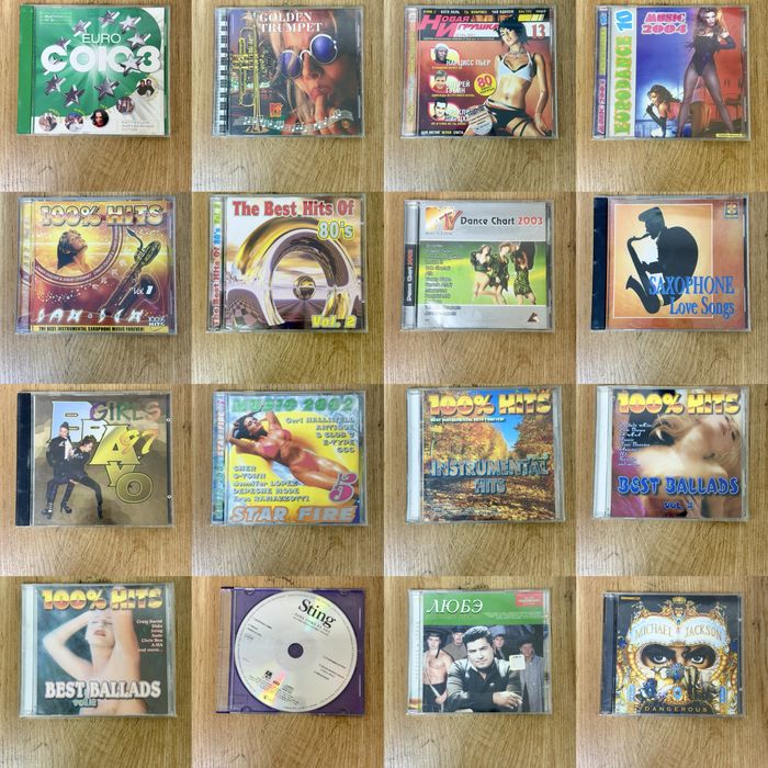 CD дисков  AC/DC, Pink Floyd, Mariah Carey, Bryan Adams и другие