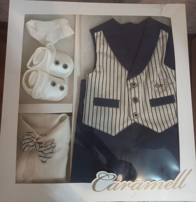 Новый костюм для новорожденого.62-68 см.Пришел на подарок от крестных.