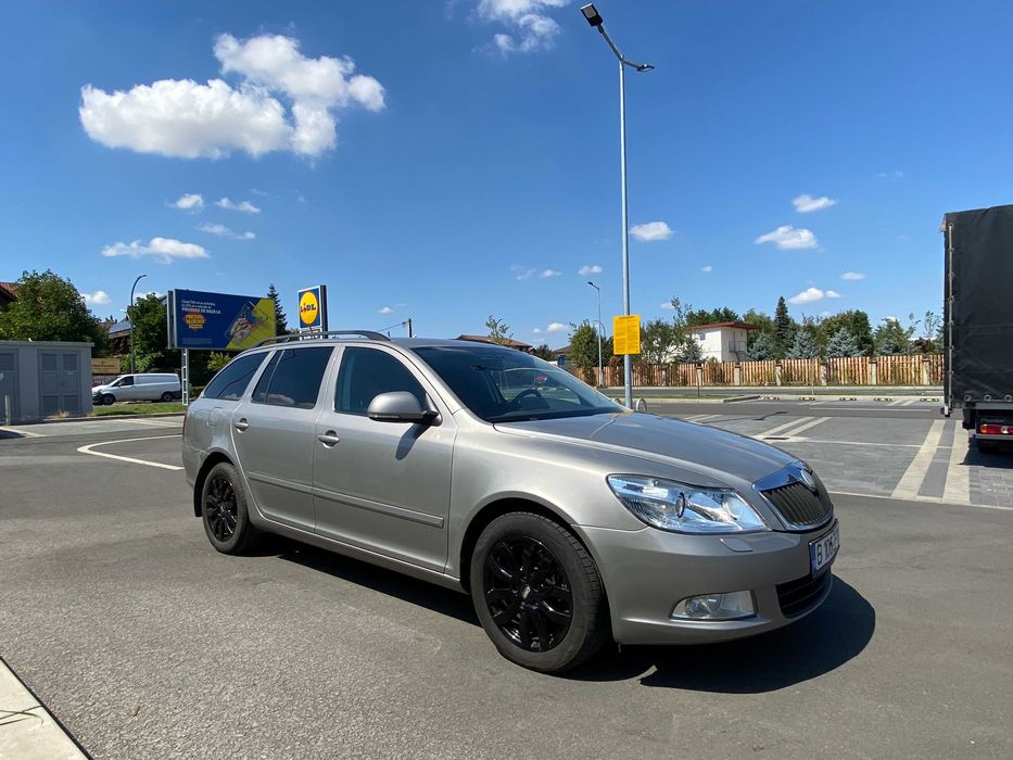 Skoda Octavia 2 Facelift 1.6 TDI - Roti Iarna, Bare Portbagaj Incluse!