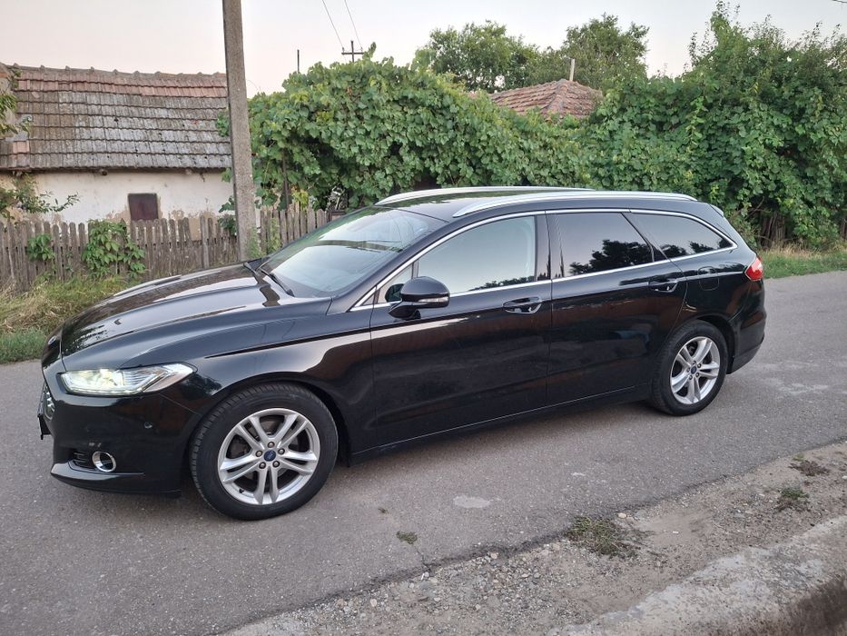 Vând Ford mondeo