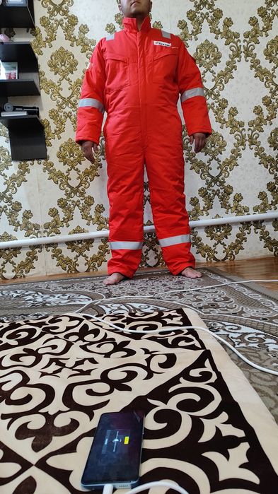 Продам фирменный комбез