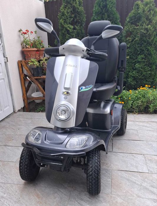 Scuter dizabilitati Kymco For U cu 4 roti 15km/h, 180kg, baterii 100Ah