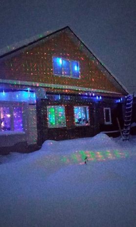Лазерное шоу на фасад дома / Лазерный проектор уличный новогодний