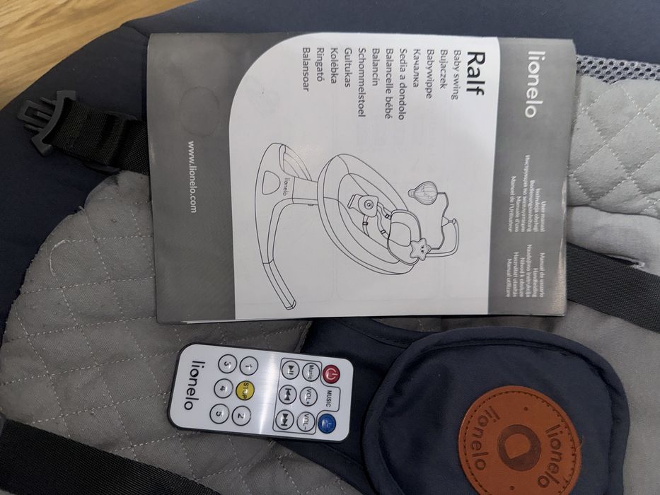 Leagan electric Lionelo Ralf- cu telecomanda si jucarie, stare f buna