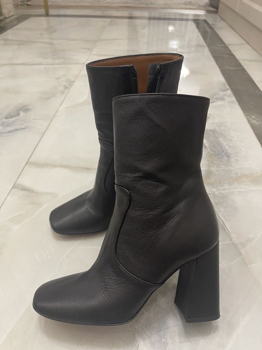 Продам новые сапоги