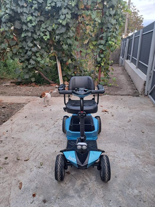 Cărucior scuter electric