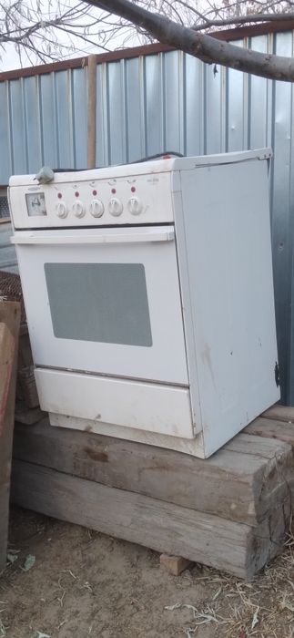 Газ плита,жұмыс жасап тұрған