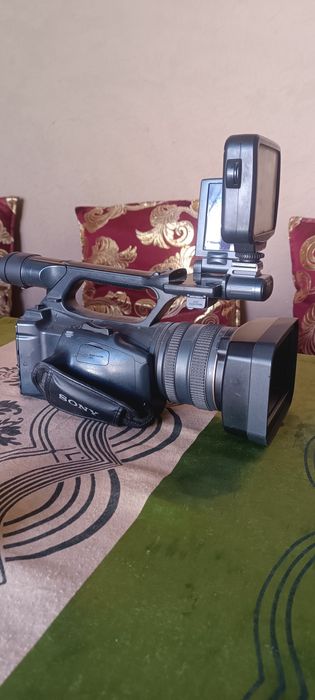 FX1000 видео камера сотилади