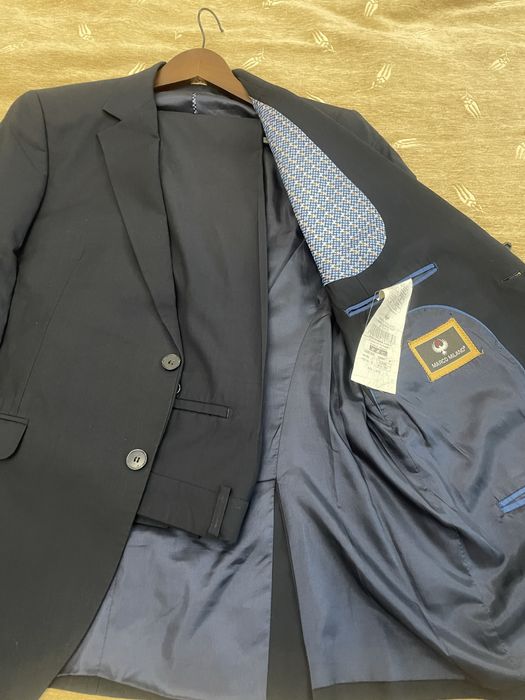 Продам мужские костюмы