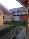 Casa la tara de vanzare