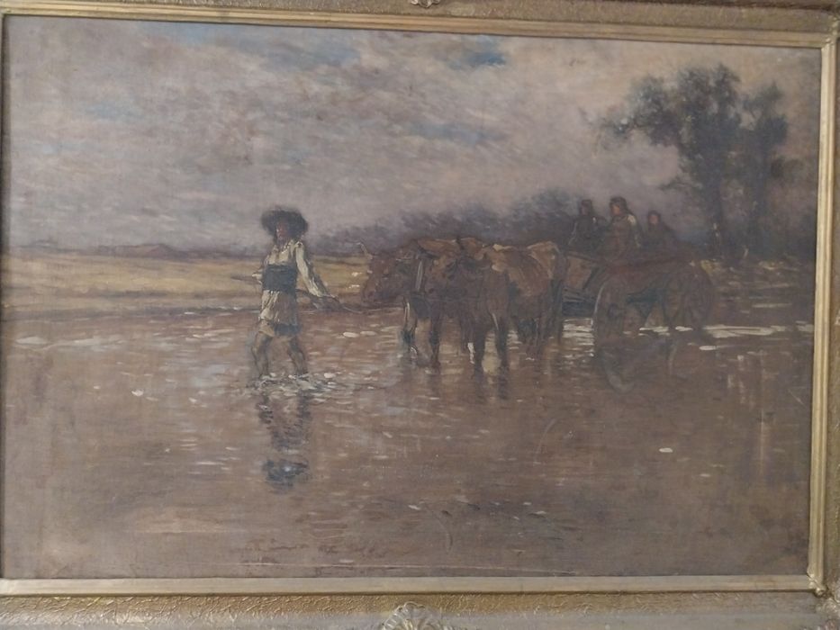 Car cu țărani traversând un parau.