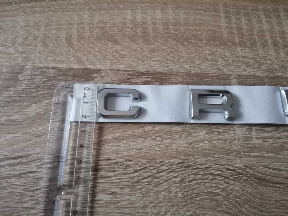 Toyota Land Cruiser сребрист надпис лого