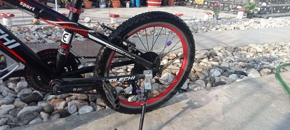 Vând bicicleta pentru copii de 7-13 ani
