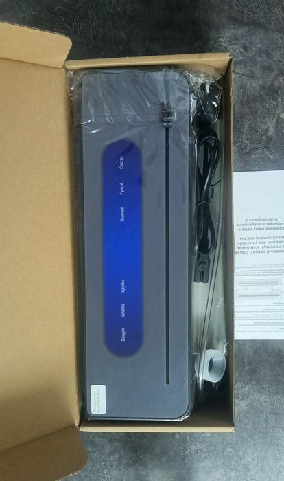 Вакуумный упаковщик Вакуумный упаковщик с резаком и запаикой серый