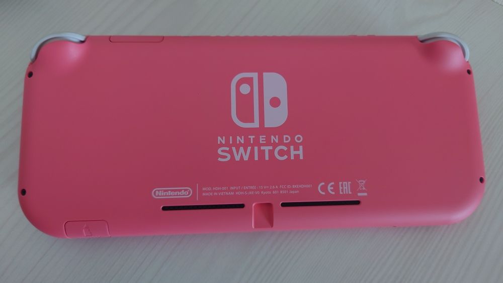 Nintendo Switch Lite + Card microSD 512 GB + Carry Case