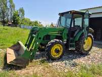 Ofer spre vanzare un tractor john deere 2004