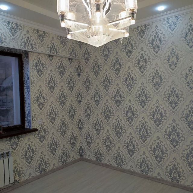 Ремонт квартир Поклейка обоев