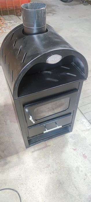 Vând Soba/Șemineu cu ușa din geam