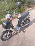 Scuter electric cu pedale