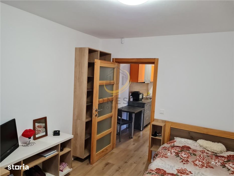 Apartament cu o camera  garsoniera, 35 mp cu loc de parcare, aproape d