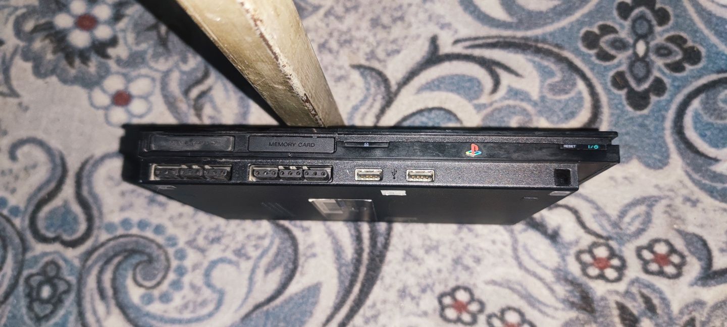 Продам PS2 с играми