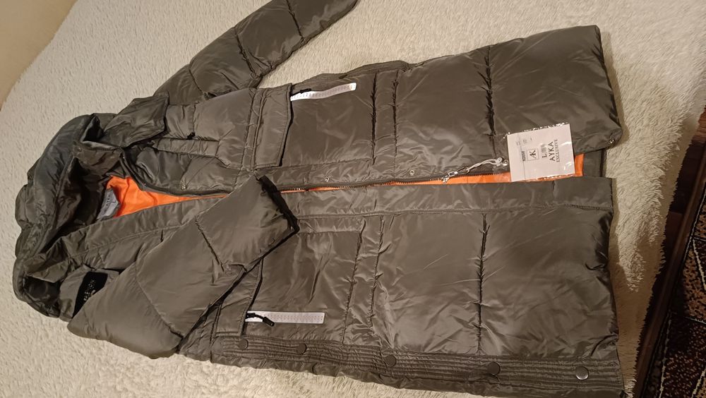 Продам классную новую зимнюю куртку размер 46-48