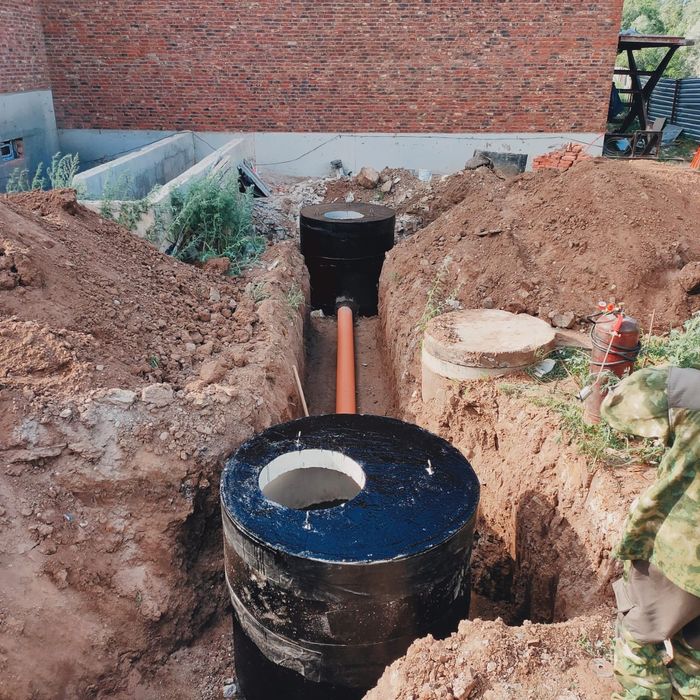 Бригада сантехников с большим  стажем работы