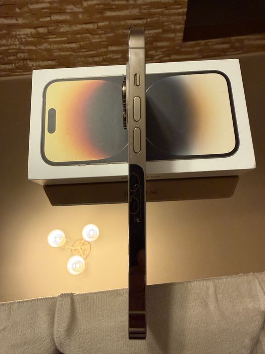 - IPHONE -14-PRO GOD/128 gb,full box,battery health 85%