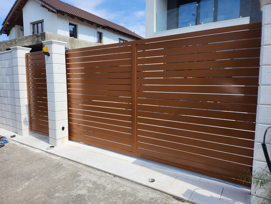 Porti si garduri auto moderne din profile de aluminiu sau oțel