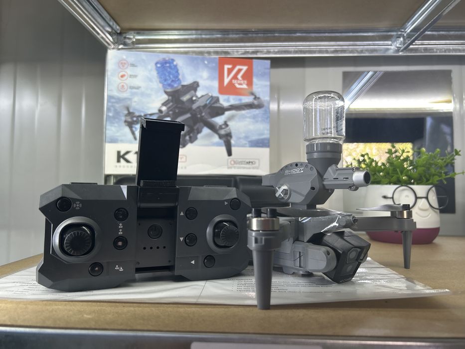 Drona K11 cu impuscaturi
