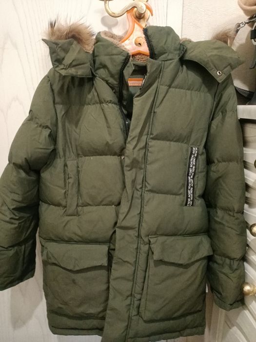 Продам зимний пуховик на мальчика.