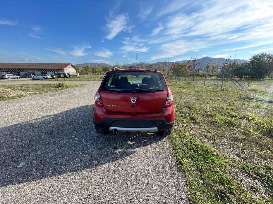 Dacia Sandero 1.6 benzină 2011 Ac 212000 km rosie cutie manuala 84 cp