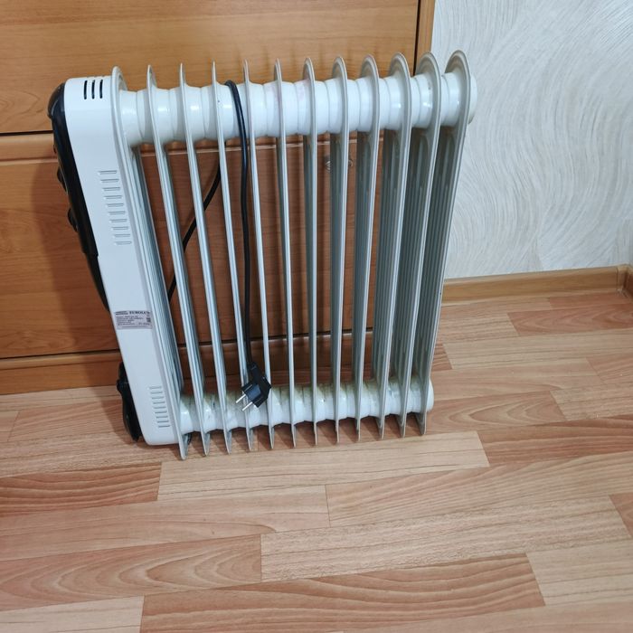 Продам обогреватель масляный.