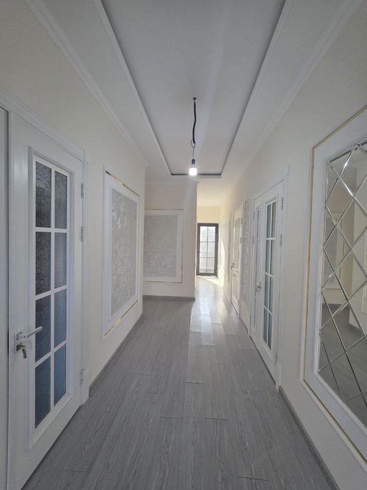 Кибрай Бурота махалла янги уй 3 хона 2,3 сотих .