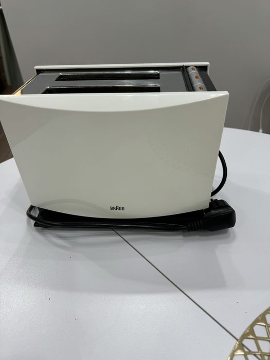 Тостер доя поджаривания  кусочков хлеба .