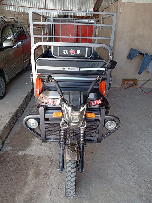 Мотоцикл трицикл